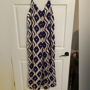 Navy and Off White Jumpsuit with adjustable straps. Thin silky fabric. NWOT.